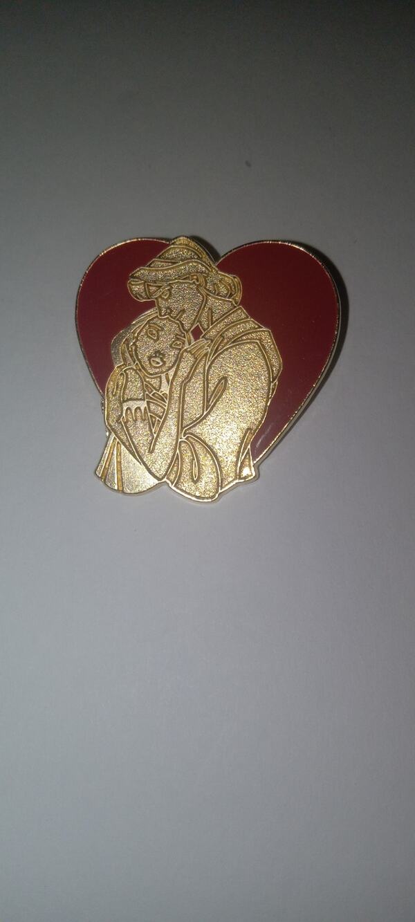 Disney pocahontas heart pin.